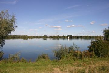 Reservoir with sailing yacht