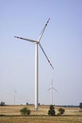 Fototapeta premium Three energy wind turbines