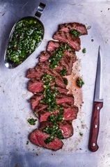 Zelfklevend Fotobehang Sliced beef barbecue steak with chimichurri sauce © tbralnina