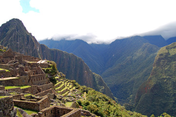 Machu Picchu on a cloudy day, Peru © kdegraauw