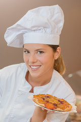 Chef showing fruit tart