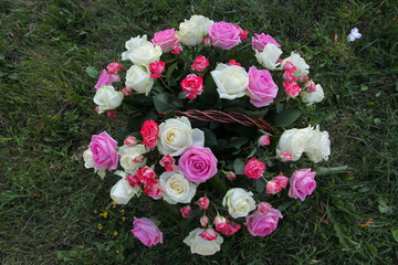 bright festive beautiful wedding bouquet of roses in a basket