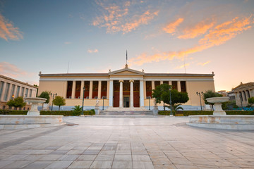 Fototapeta na wymiar Building of the National & Kapodistrian University of Athens in Panepistimio is one of the landmarks of Athens