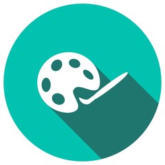 palette and paintbrush with a long shadow