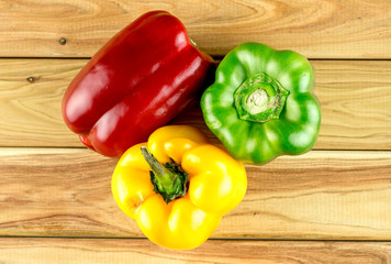 Ripe peppers on chopping board