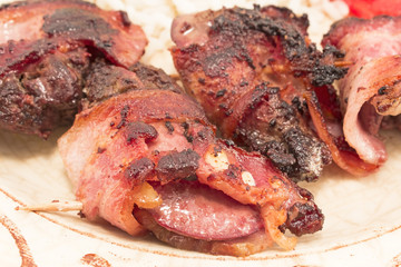 Chicken livers in bacon