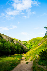 Obraz premium Green Hills, River Dove in Peak District National Park