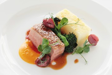 plated duck breast meal dinner