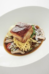 plated pork noodle meal