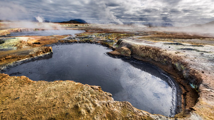 Full of sulfur and steam Namafjall terrain in Iceland