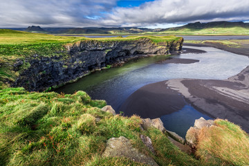 Obraz premium Small bay with cliffs in Iceland