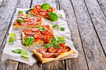 Pie with tomatoes, cheese and Basil
