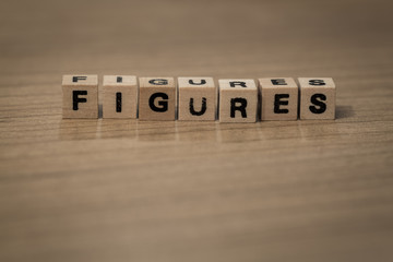 Figures in wooden cubes