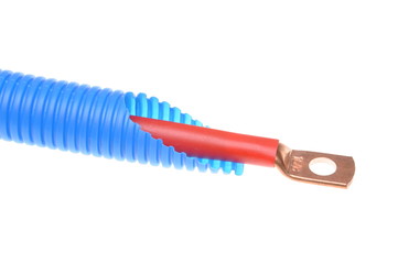 Corrugated plastic pipe with electrical cable isolated on white background