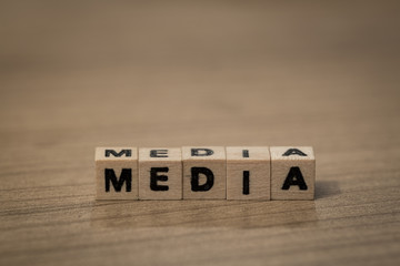Media in wooden cubes
