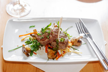 Fresh Argentine beef steak with mushroom and vegetables