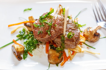 Fresh Argentine beef steak with mushroom and vegetables