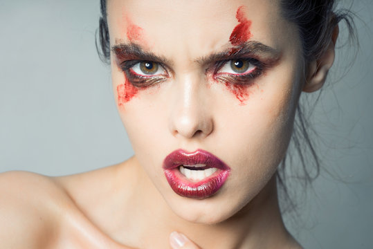 The girl with an interesting make-up of blood