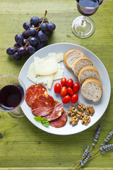 appetizer and red wine. pecorino, parmesan cheese, fresh bread,