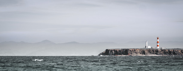 Landscape with a lighthouse from the sea at Ensenada, Mexico - 92241088