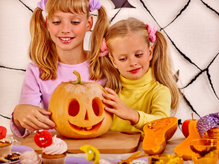 Fototapeta premium Halloween party with children holding trick or treat.