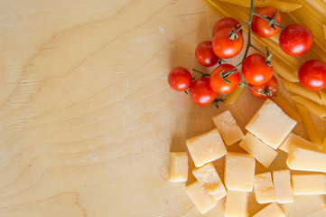 Grana padano with pasta and tomatoes