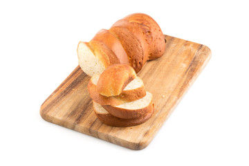 Sliced bread on a wooden chopping board