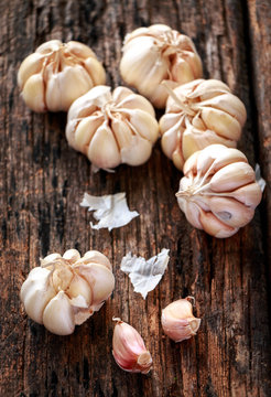 Garlic on old wooden background