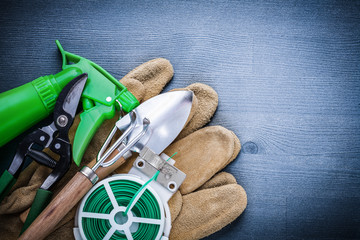 spade fork wire secateurs sprayer glove on board