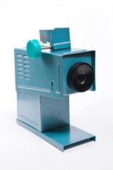 Retro cine-projector on the white background.