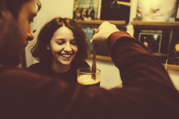 Vintage couple hugs and laughing