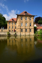 Obraz premium Water castle Villa Concordia on the Regnitz river in Bamberg, Germany 
