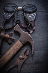 vintage tools  hammer pliers goggles clamp