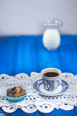 Cup of coffee and cookie in coffee shop vintage color  