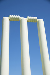 Cricket stumps with blue sky