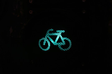  Bicycle sign in the city by night