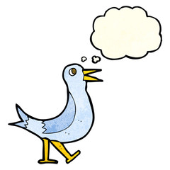 Obraz premium cartoon walking bird with thought bubble