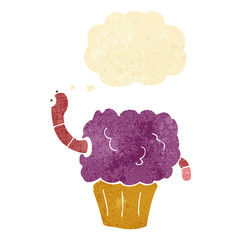 cartoon worm in cupcake with thought bubble