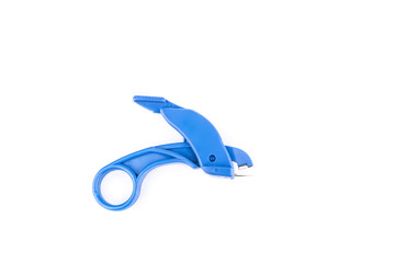 dark blue staple remover on white background