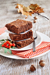 Chocolate brownies, cake or chocolate squares, Thanksgiving or autumn table setting