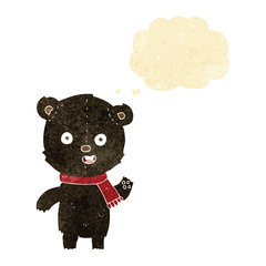 cartoon waving black bear cub with scarf with thought bubble