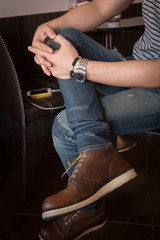 Fototapeta premium brown boot leather shoes and jean pants clothing fashion of man