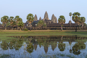 Fototapeta na wymiar Angkor Wat and reflecting lake in sunset, Siem Reap, Cambodia