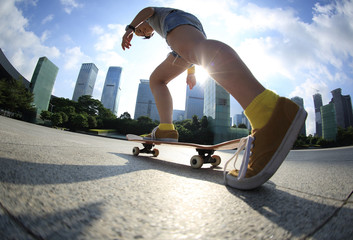 skateboarder skateboarding at sunrise city