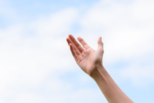 Young Woman Hand On Sky