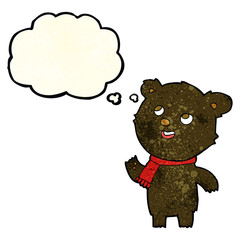 cartoon black bear wearing scarf with thought bubble