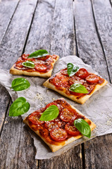 Pie with tomatoes, cheese and Basil