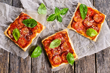 Pie with tomatoes, cheese and Basil