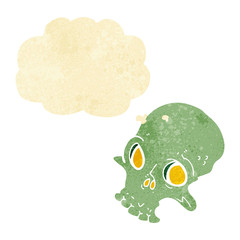 cartoon spooky skull with thought bubble