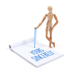 Wooden mannequin writing - Yours sincerely
